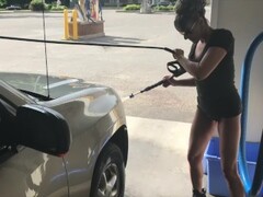 WIFE IN MINI SKIRT HIGH HEELS FLASHING GREAT ASS AT OUTDOOR CARWASH Thumb