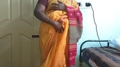 desi  indian horny tamil telugu kannada malayalam hindi cheating wife vanitha wearing orange colour saree  showing big boobs and shaved pussy press hard boobs press nip rubbing pussy masturbation Thumb